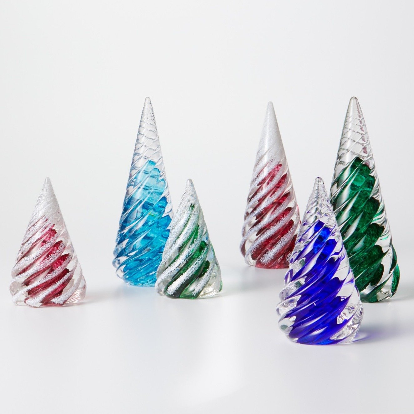 fron left: small ruby, large light blue, small dark green, large ruby, small cobalt blue, large dark green