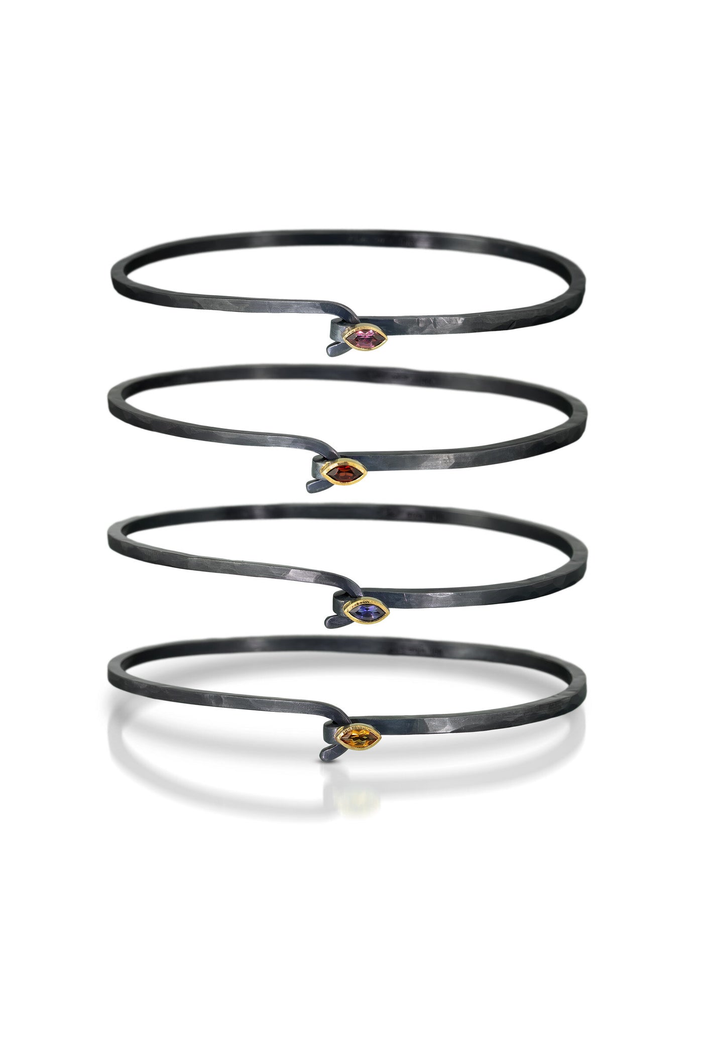 Top to Bottom: Rhodolite Garnet, Mozambique Garnet, Iolite, Citrine
