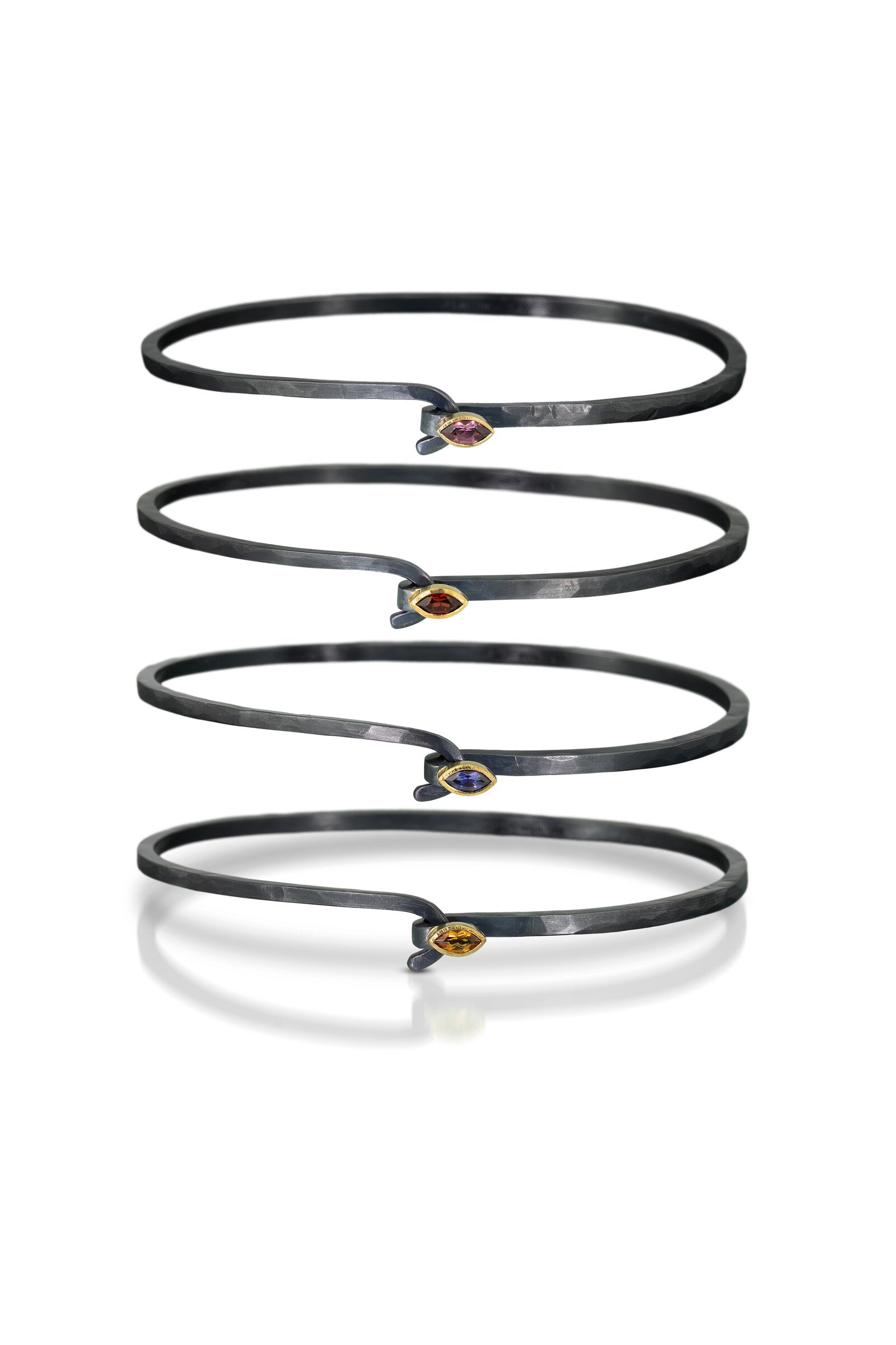 Top to Bottom: Rhodolite Garnet, Mozambique Garnet, Iolite, Citrine