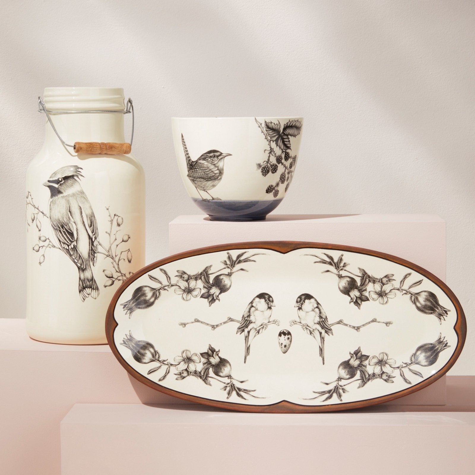 Waxwing jug with handle, carolina wren bowl, chickadee platter