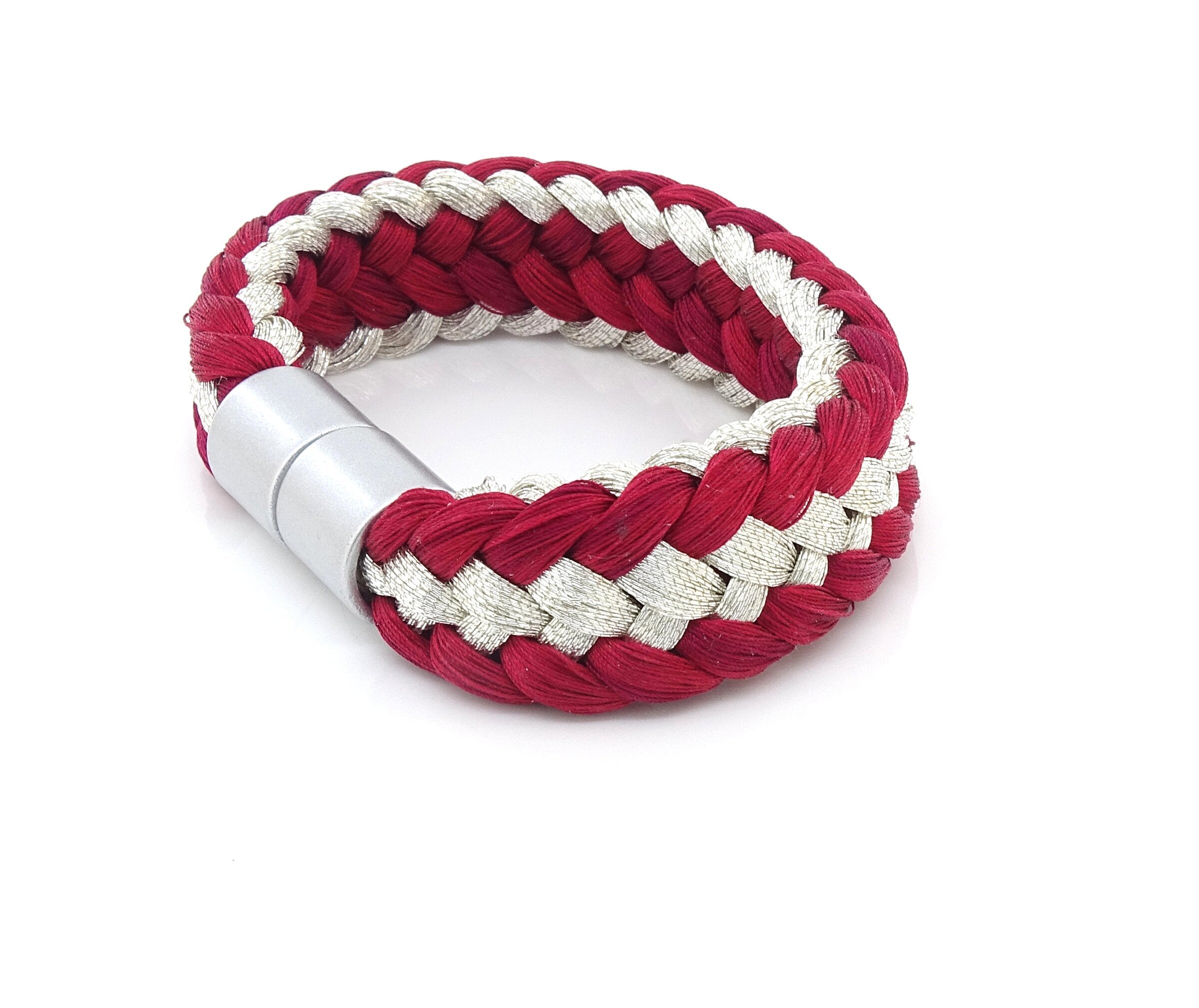 Bright Silver and Cherry Red Adorns the Wrist - bright silver framed by red.