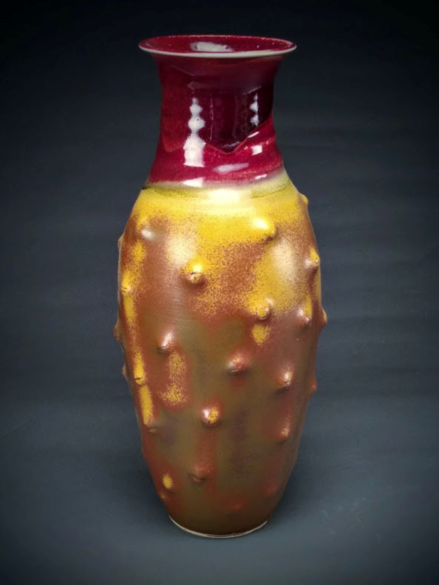 Modest Red and Mottled Orange Vessel with Protrusions