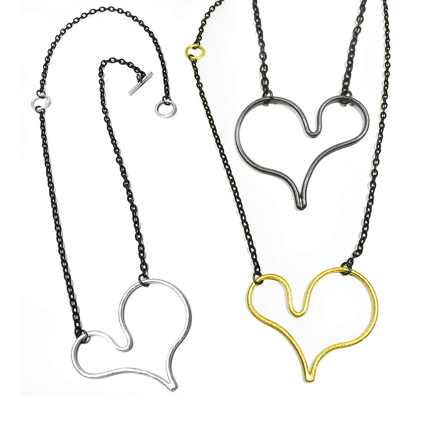 Left to Right: Brushed silver, black silver, brass
