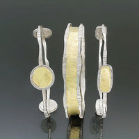 left to right: Large Circles Bangle, Charming Bangle, and Rectangle Bangle