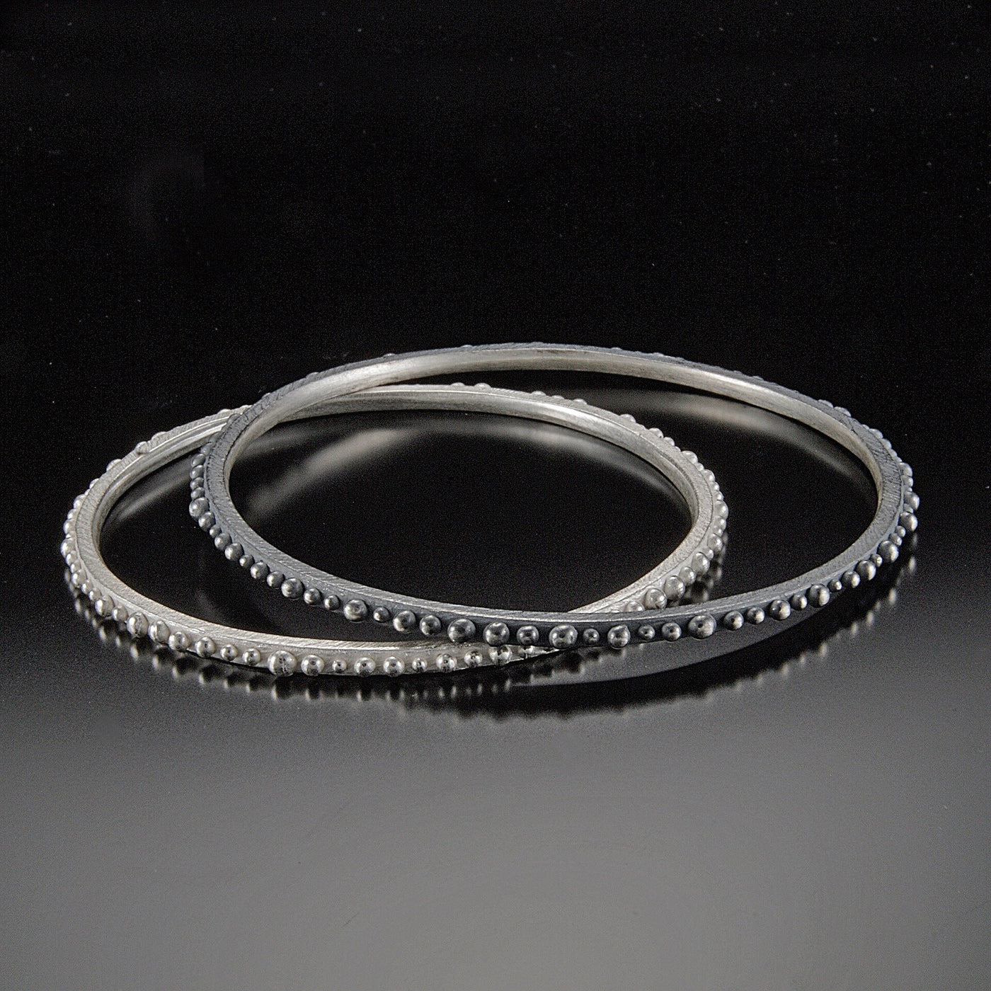 Oxidized Silver on Top, Bright Silver underneath