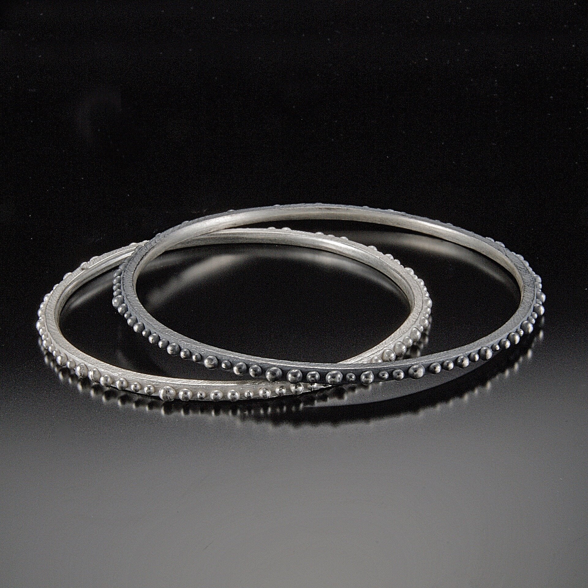 Oxidized Silver on Top, Bright Silver underneath