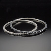 Oxidized Silver on Top, Bright Silver underneath
