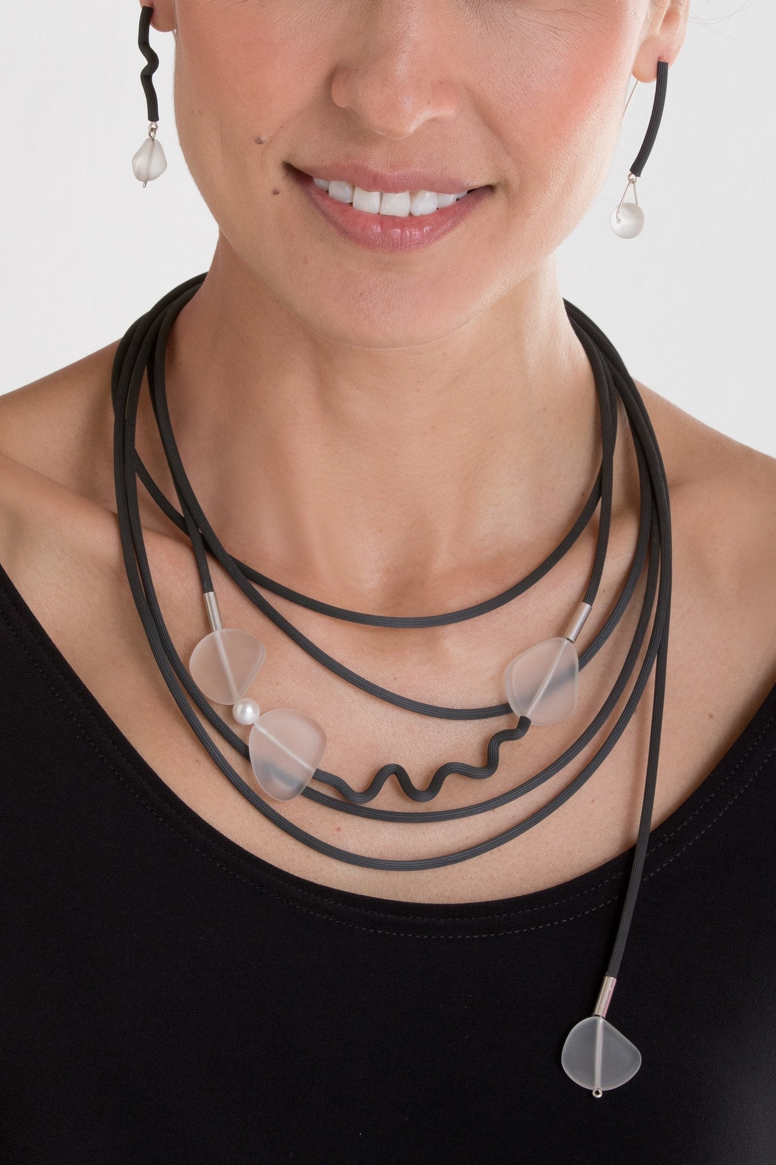 shown with the frozen in time necklace