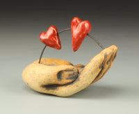 Hand with Two Hearts