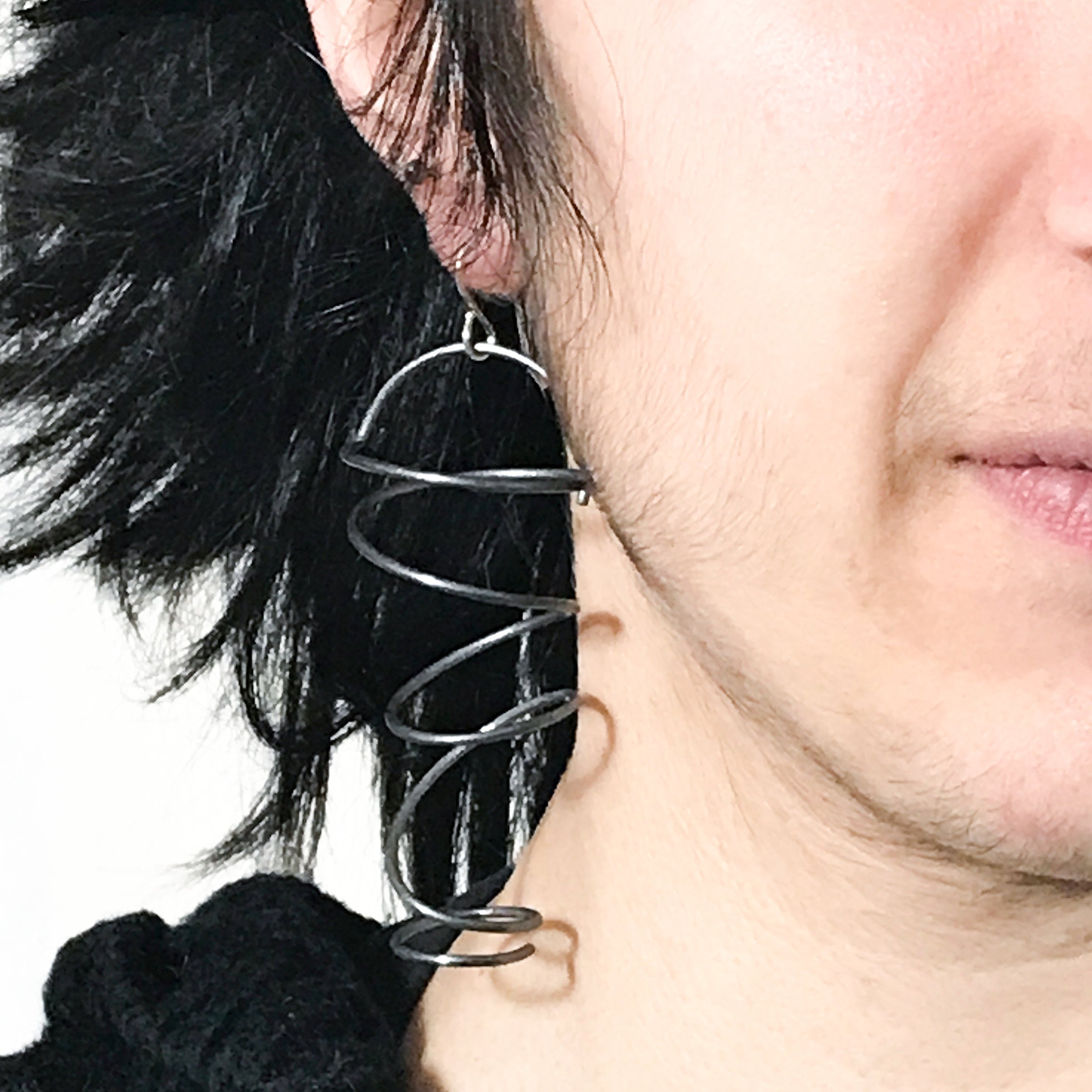 Swinging Coil Earrings