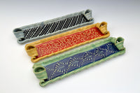 top to bottom: blue with black accent, honey with red accent, green with blue accent