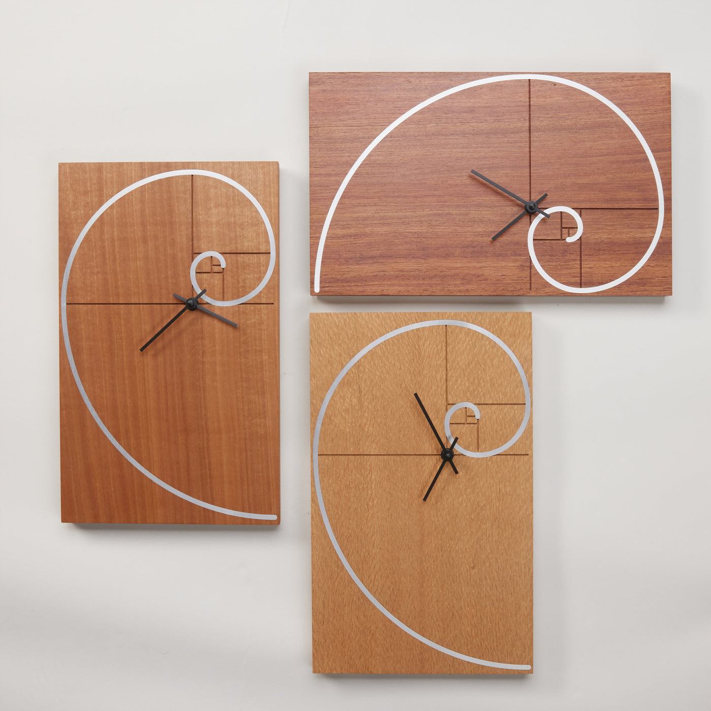 Fibonacci Spiral Clock
clockwise from left: makore, bubinga, lacewood