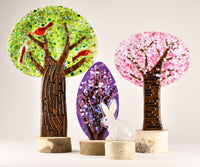 left to right: birdberry tree, faberge bush, honey bunny, blush blossom tree