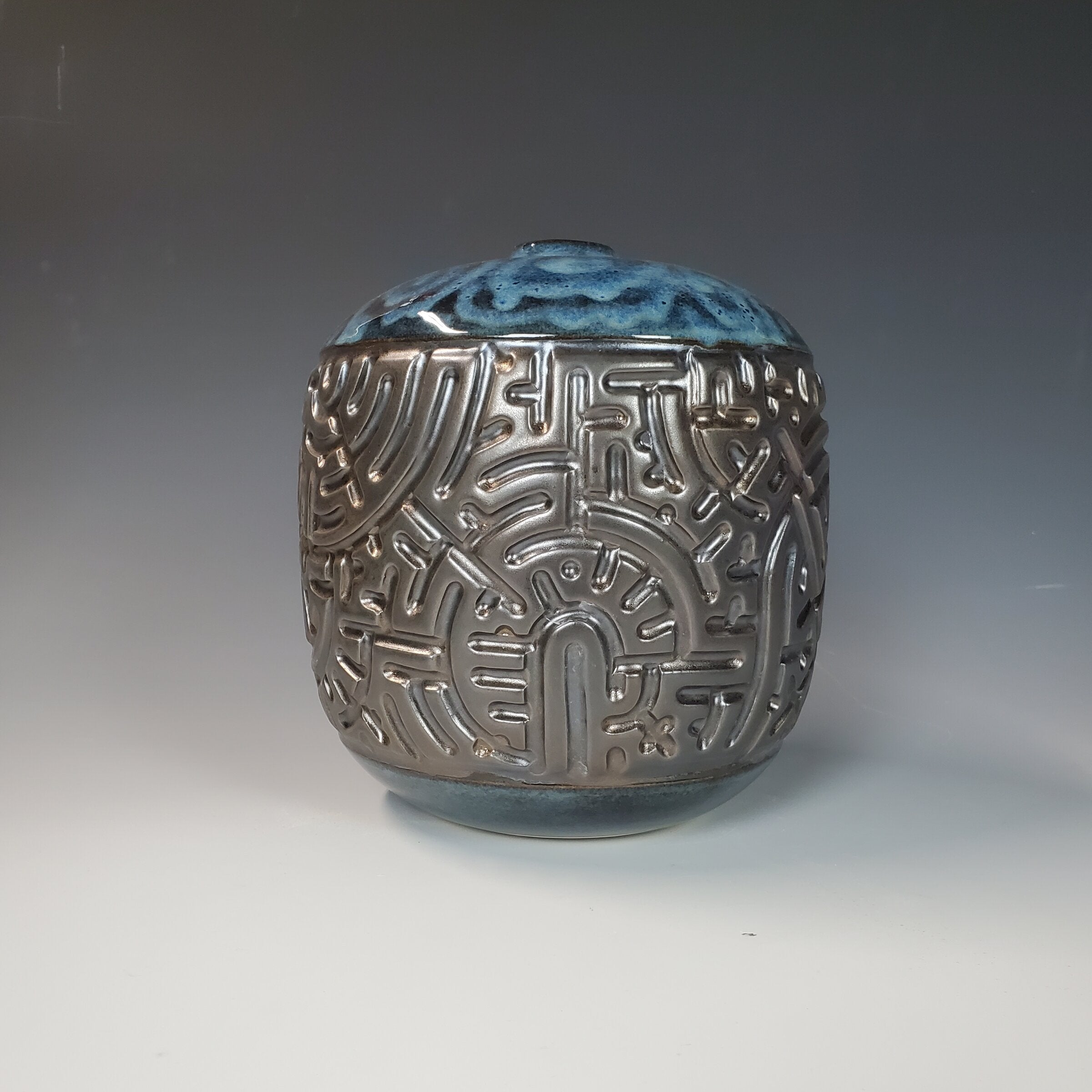 Closed Form Carved Moon Pot