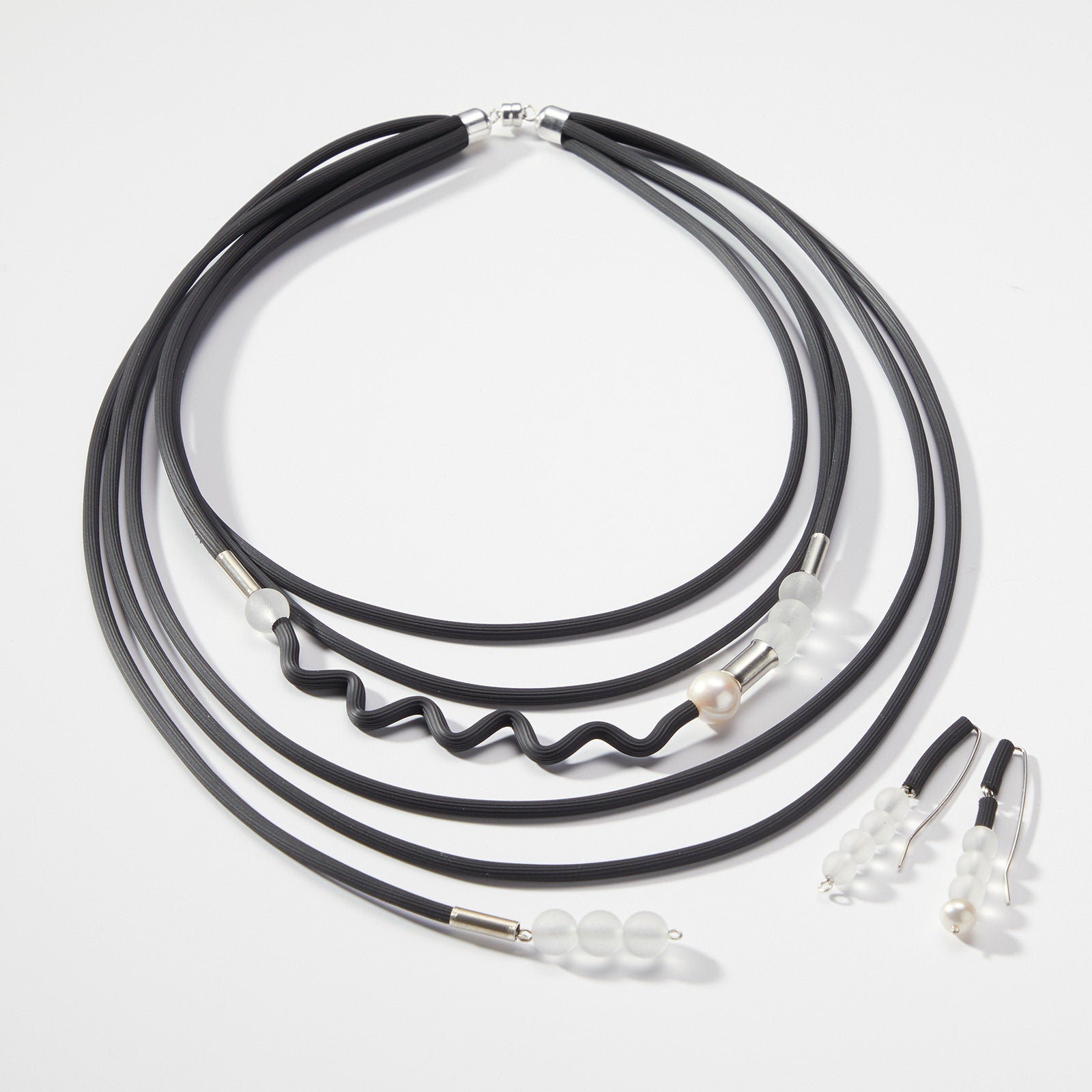 shown with the drops of glass earrings