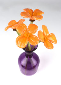 Forever Poppy Bouquet in Purple Bottle