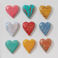 top to bottom, left to right: coral vertical, turquoise radial, marigold horizontal, white outline, red groove, blue diagonal, turquoise pebble, marigold outline, orange horizontal