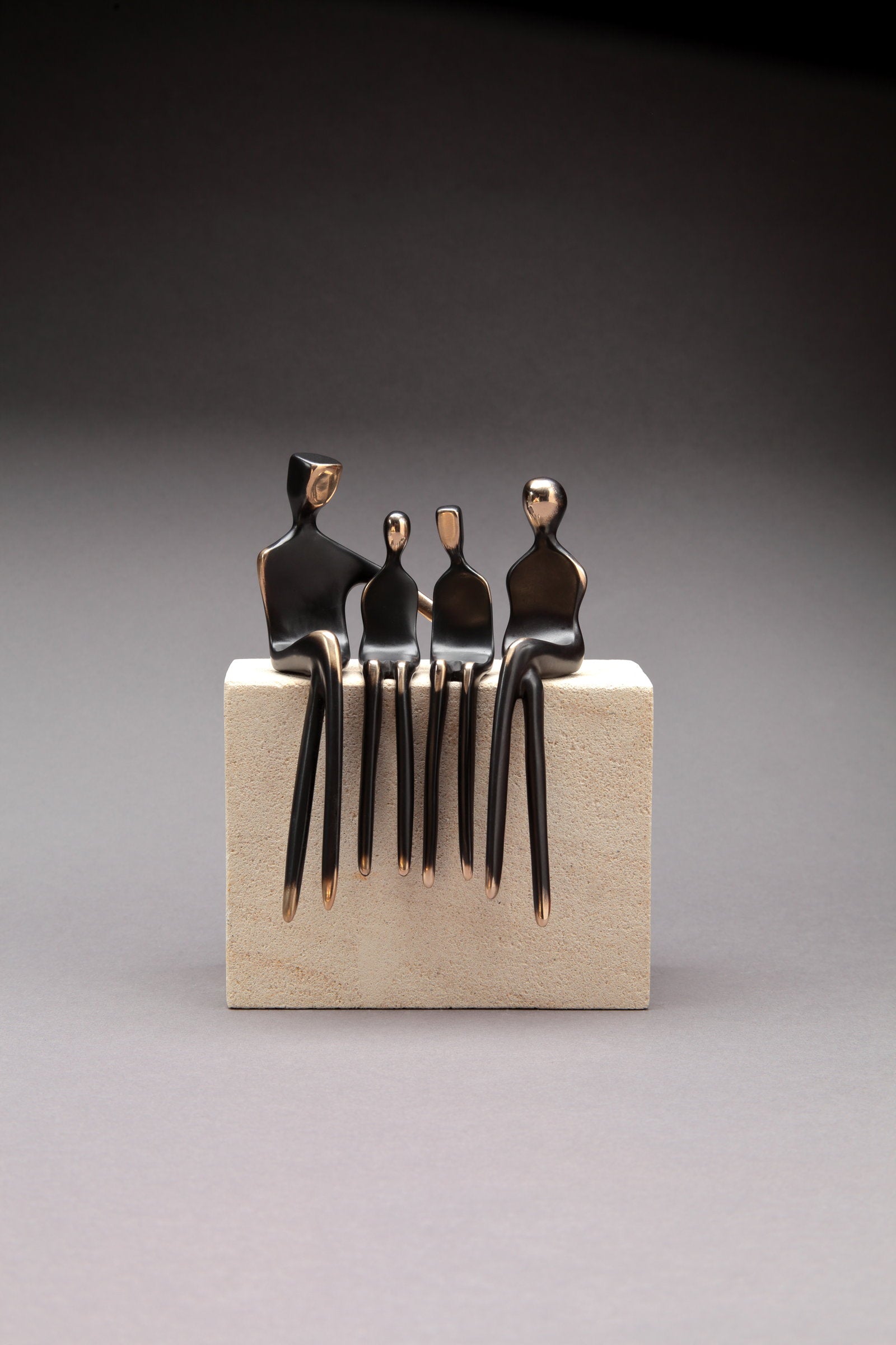 Family of Four Conversation Mounted on Limestone
