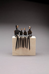Family of Four Conversation Mounted on Limestone