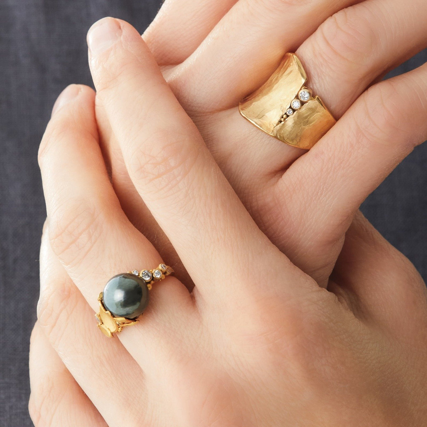 shown with the artist's Cleaved Ring