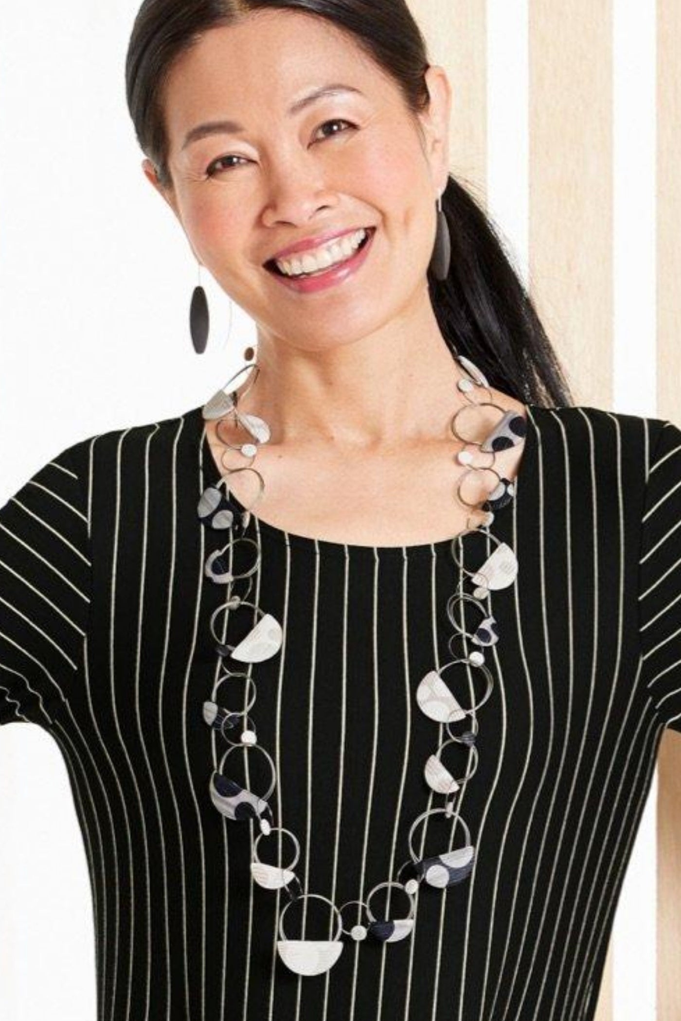 Moon Dot, shown with the Black Onyx Tri-Sided Earrings by Claudia Endler