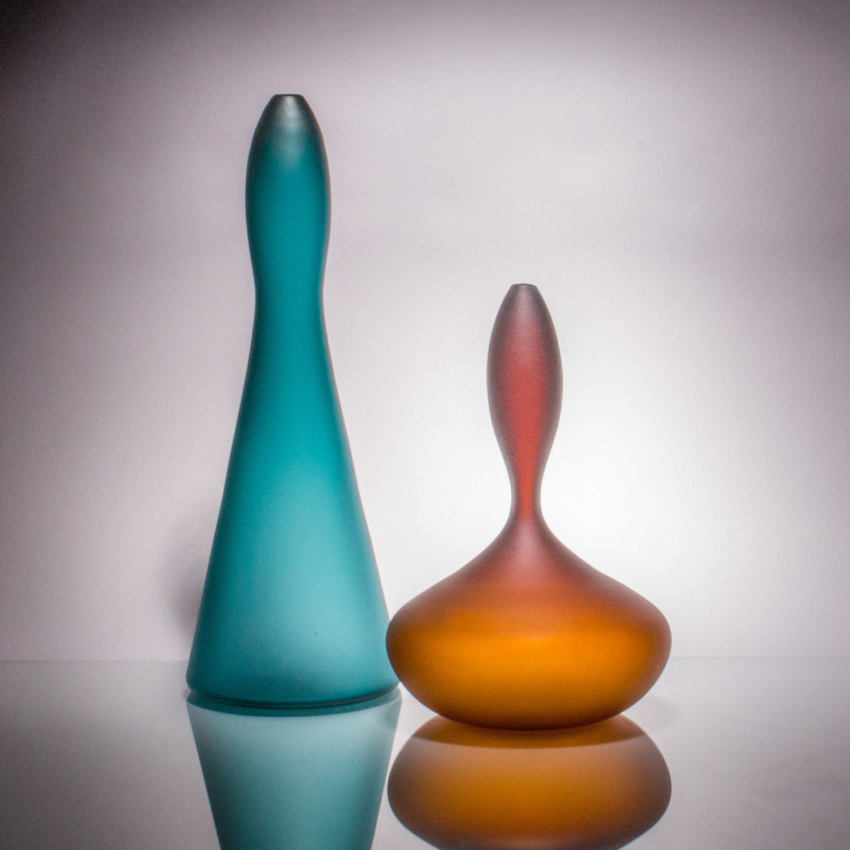 left to right: Tall Teal, Squat Amber
