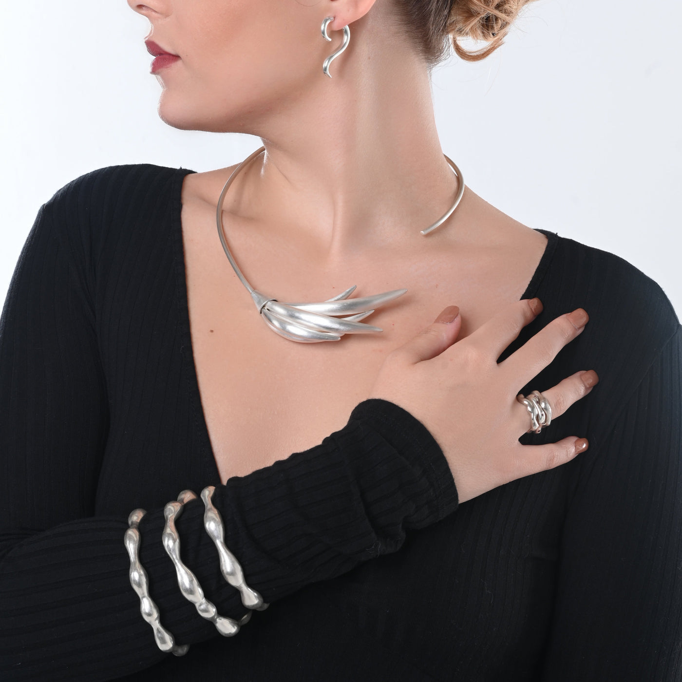 Sweeping Crescent Asymmetrical Neck Collar