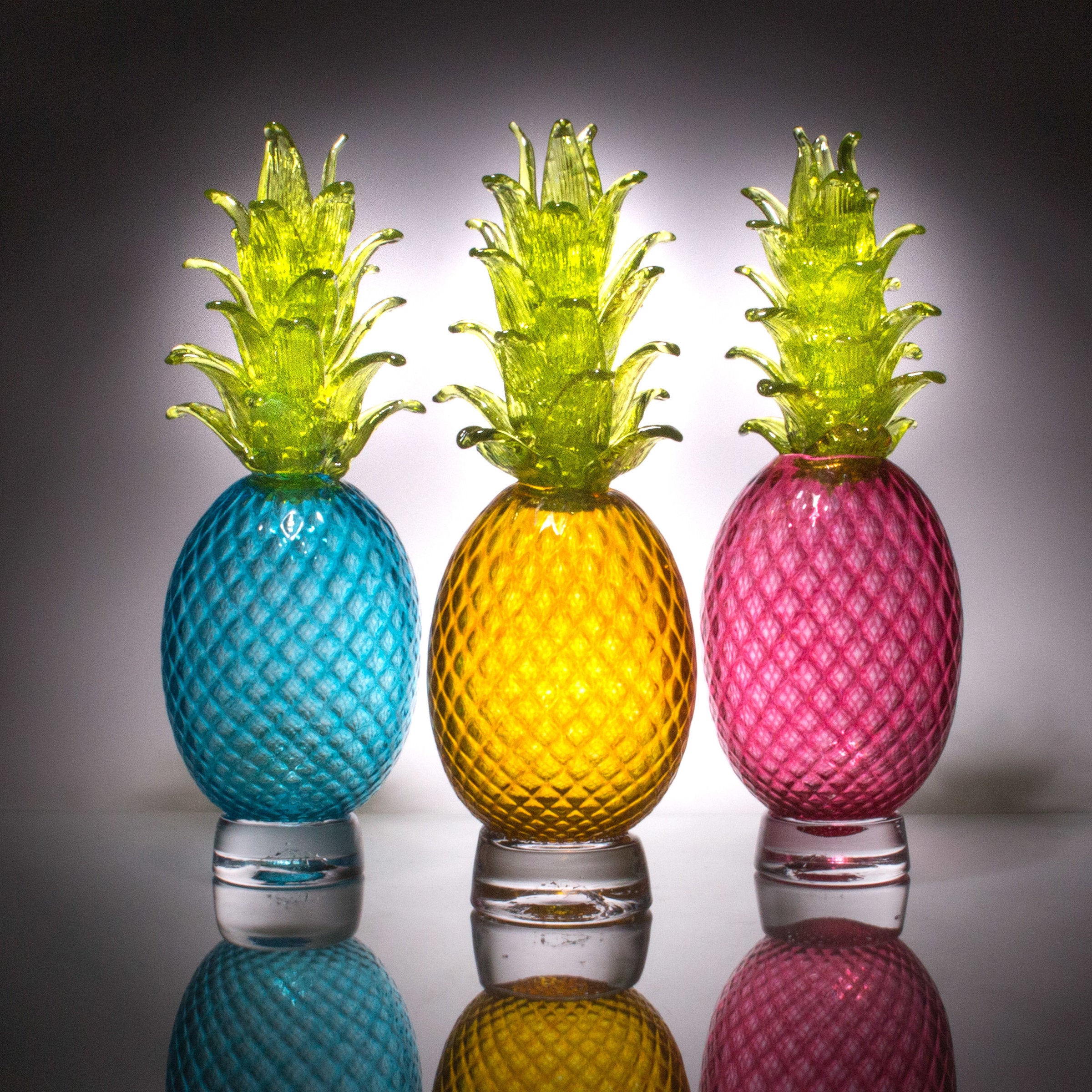 left to right: aqua, gold, pink