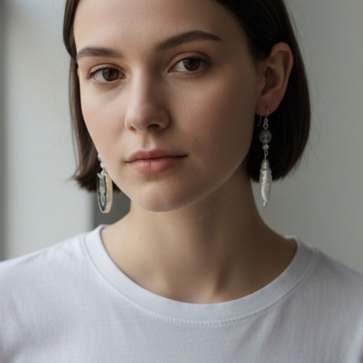 Carved Skulls Asymmetrical Earrings