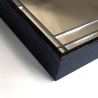 Corner detail of "Francesco 24x24" decorative wall mirror