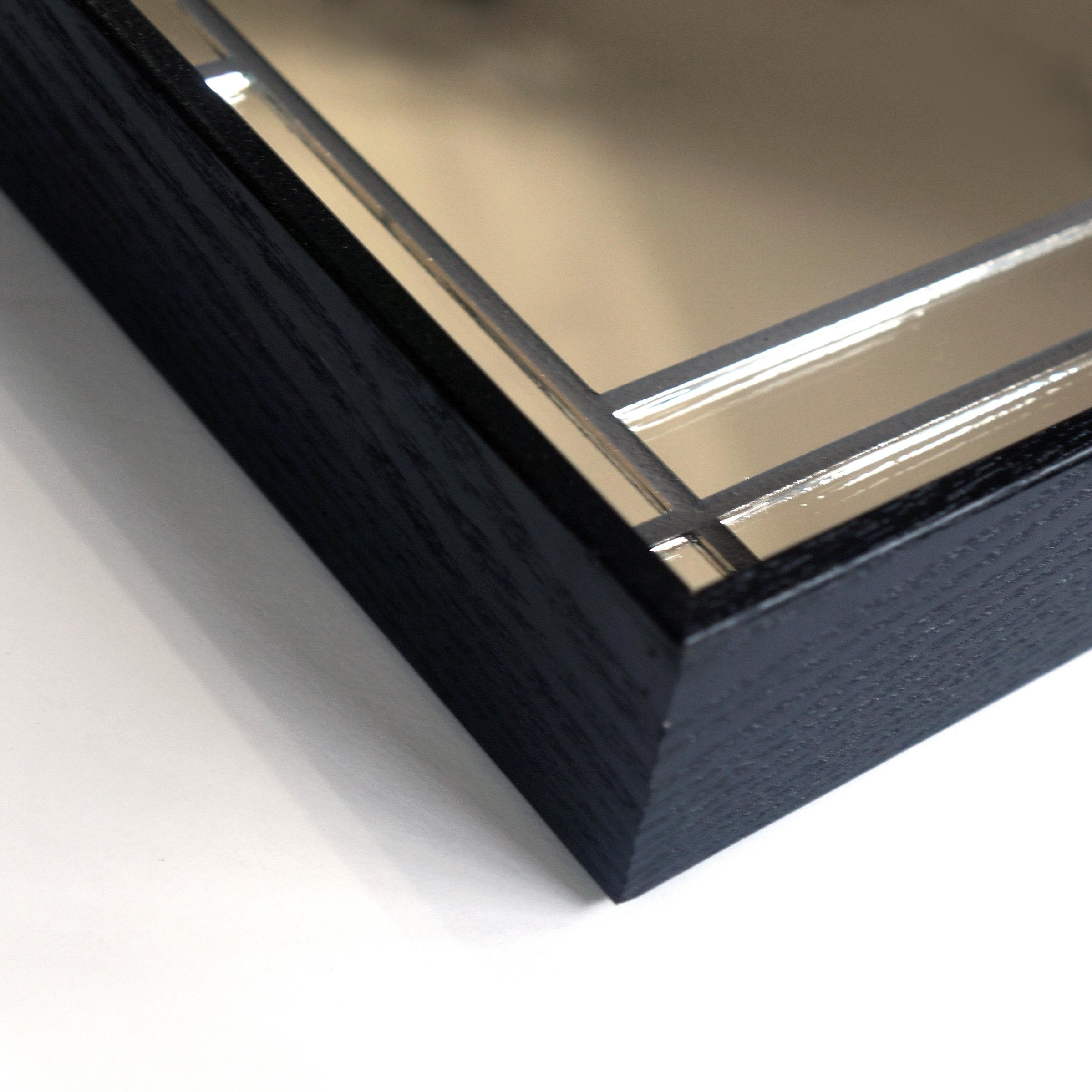 Corner detail of "Francesco 24x24" decorative wall mirror