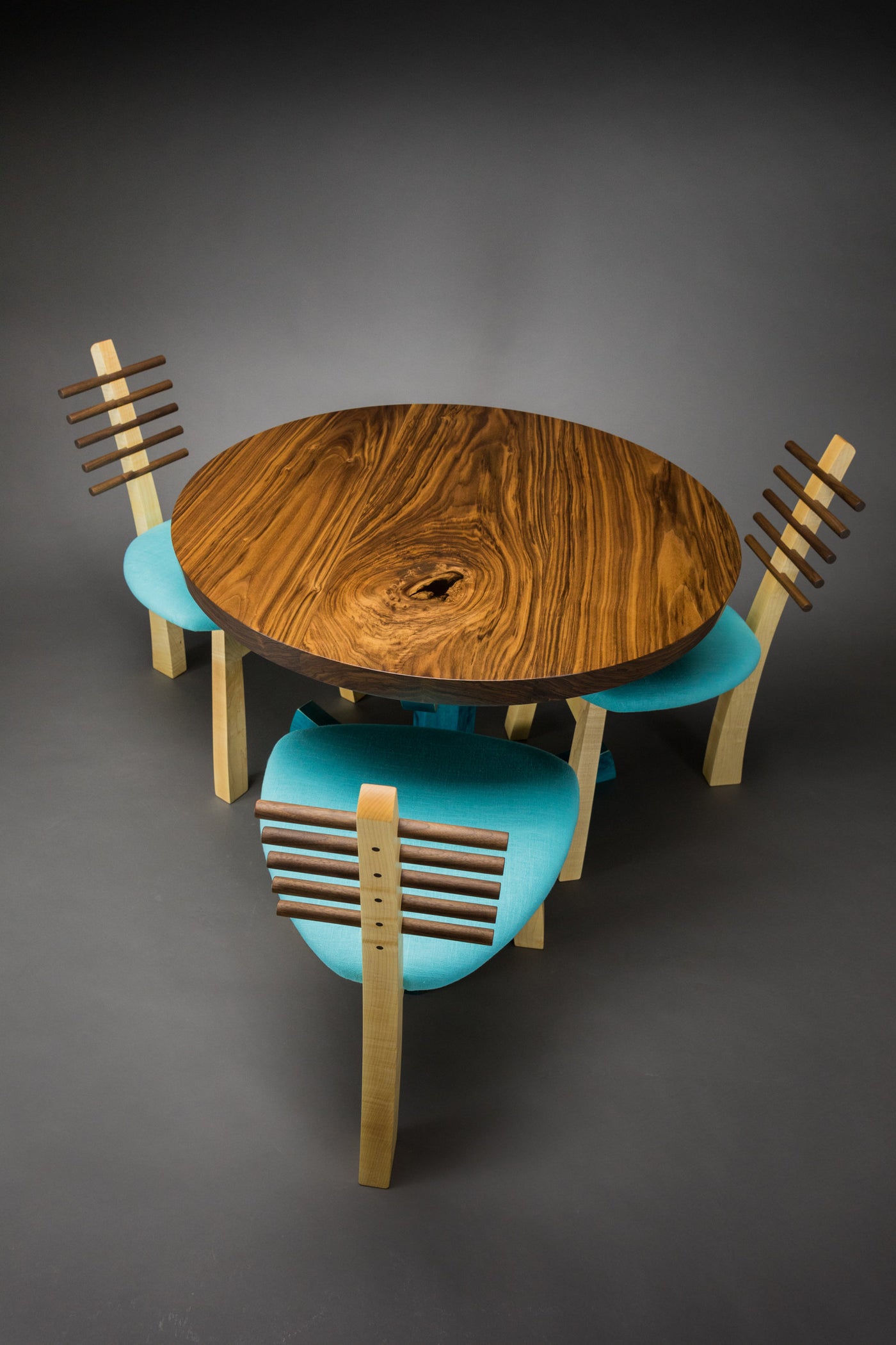 shown with the tripod chairs