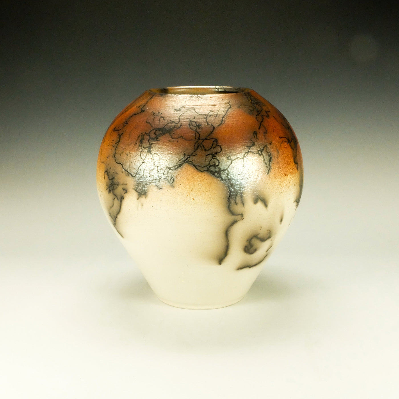 Orange, Black and White Raku Pottery