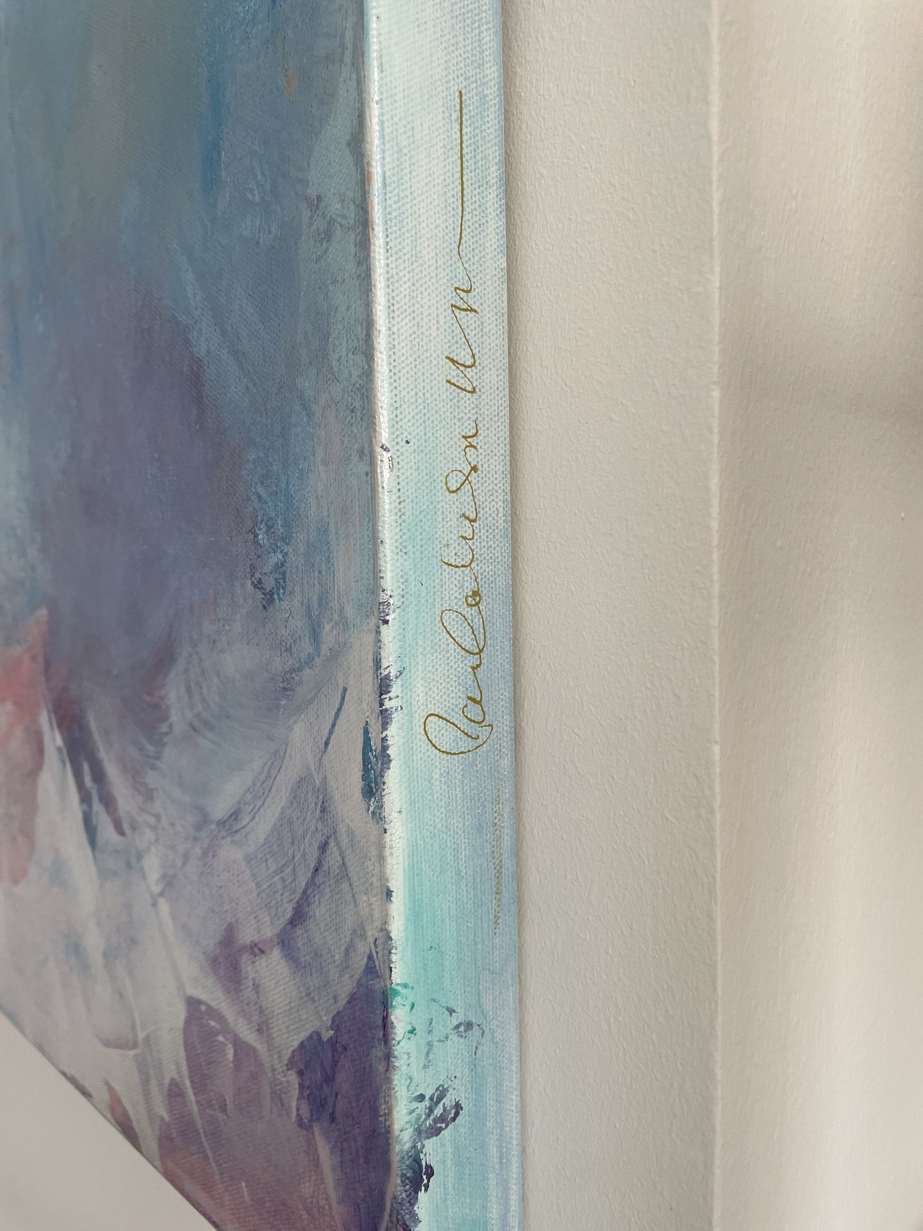 Shows part of signature on right horizontal side.