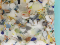 Three Confetti Plates on Blue
