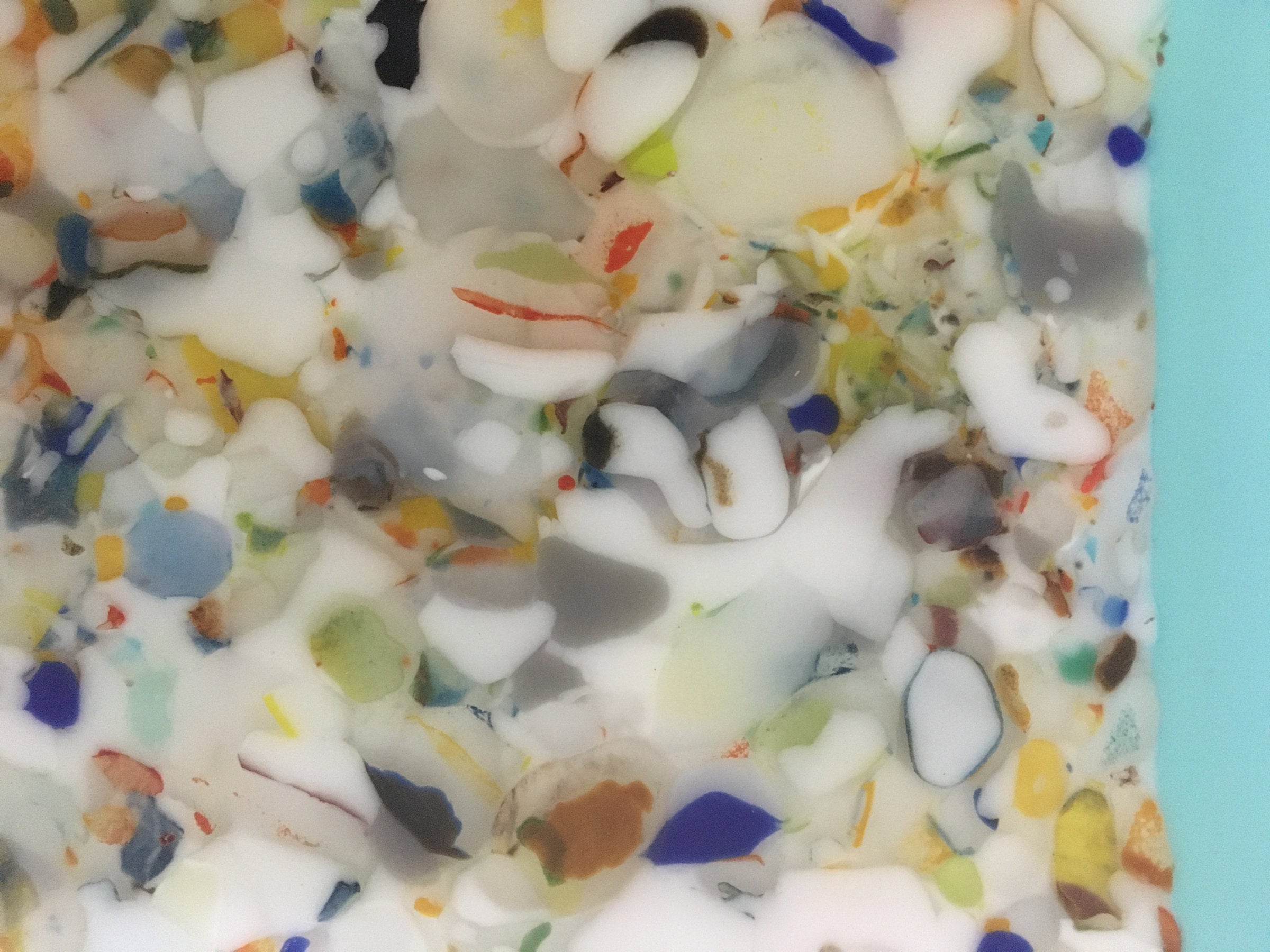Three Confetti Plates on Blue