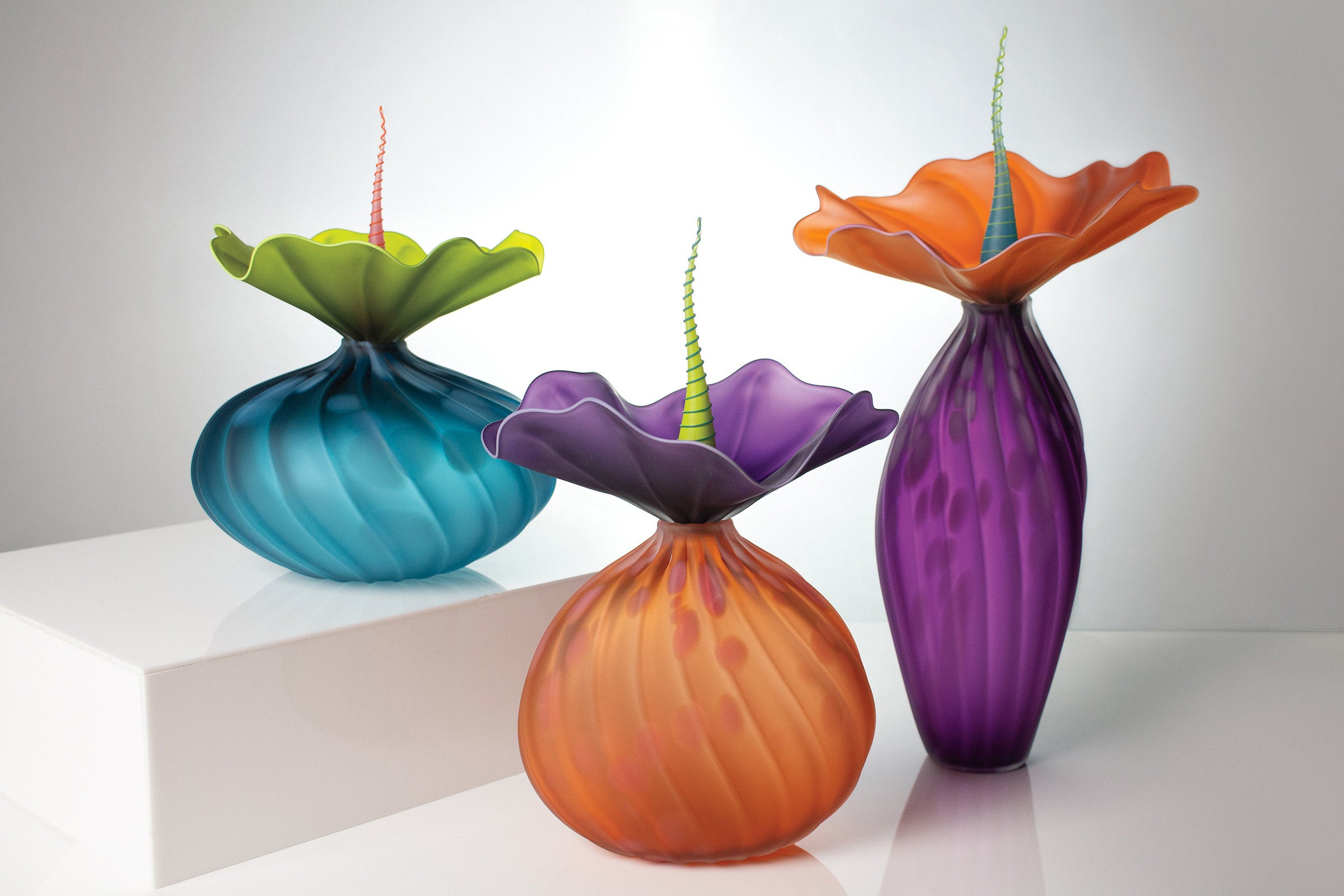 left to right: urchin sea green, lima apricot, tall plum hyacinth