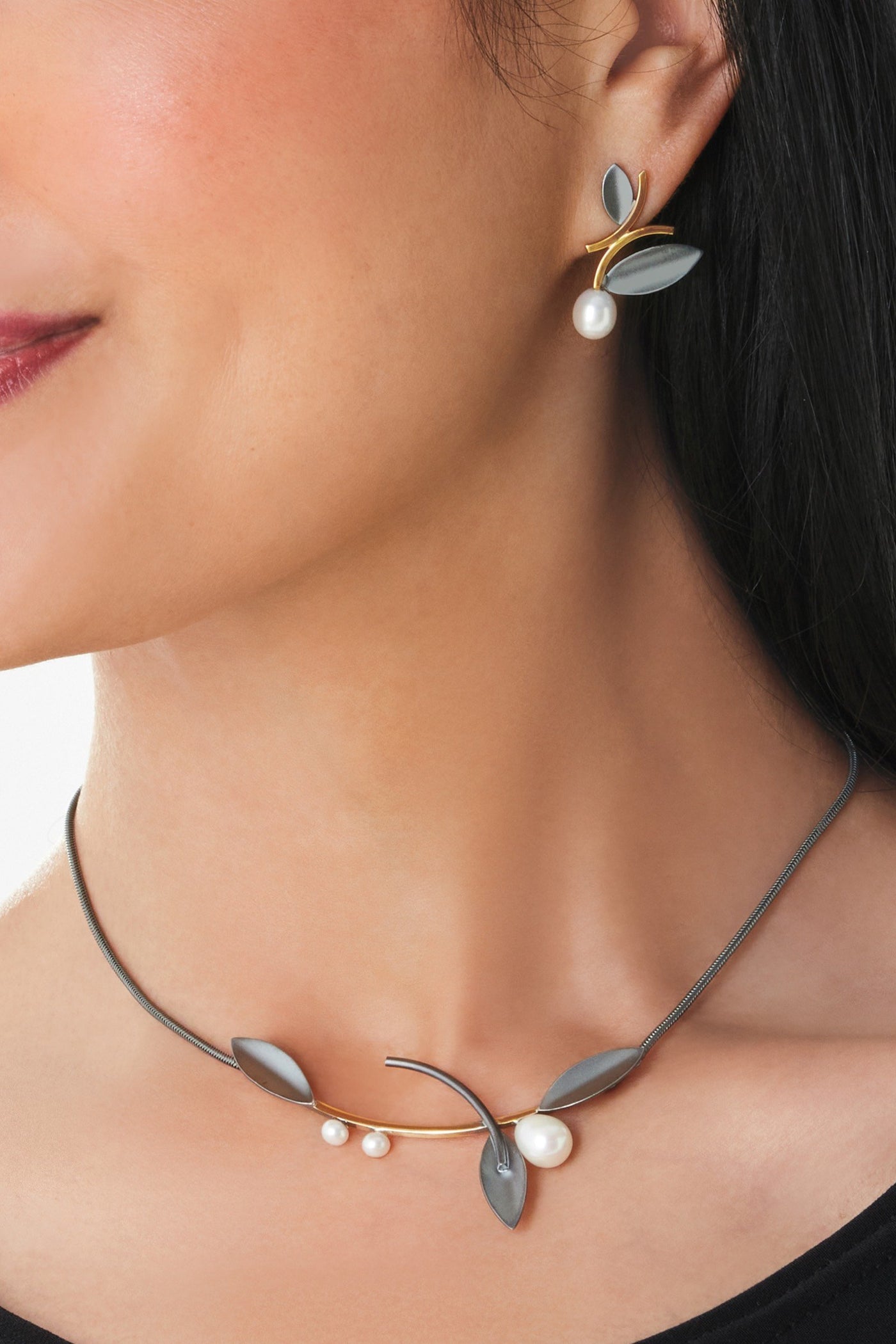 oxidized silver and gold, shown with the artist's coordinating alternating leaf necklace with white pearls
