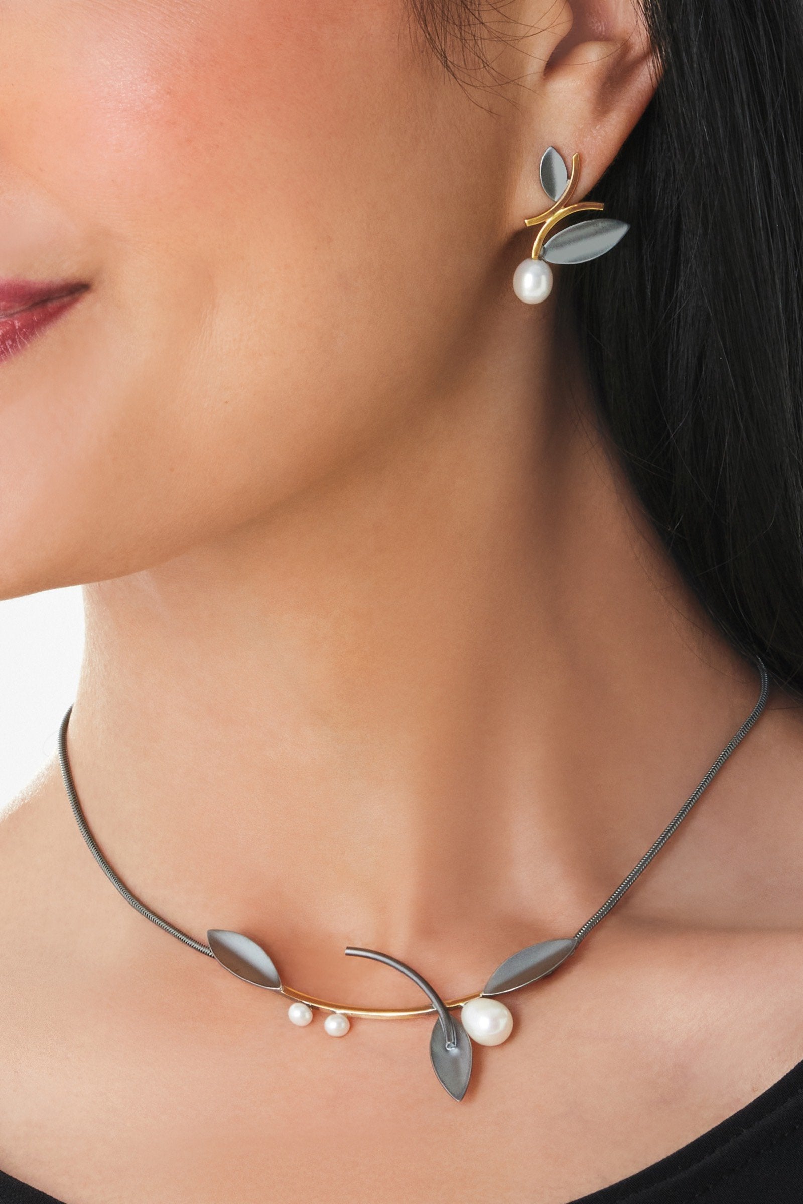 oxidized silver and gold, shown with the artist's coordinating alternating leaf necklace with white pearls