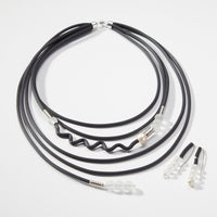 shown with the drops of glass necklace