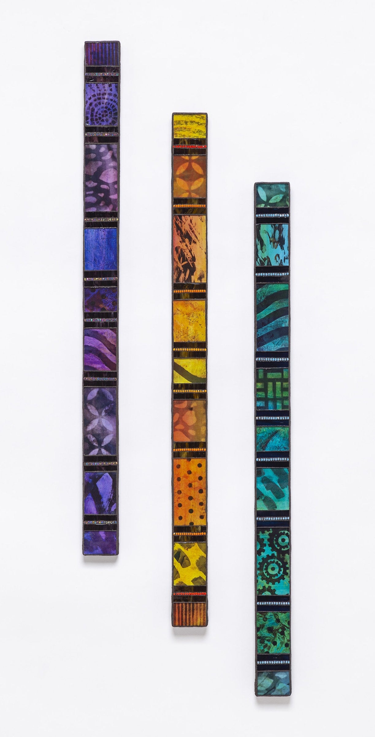 left to right: Purple, Orange, Green