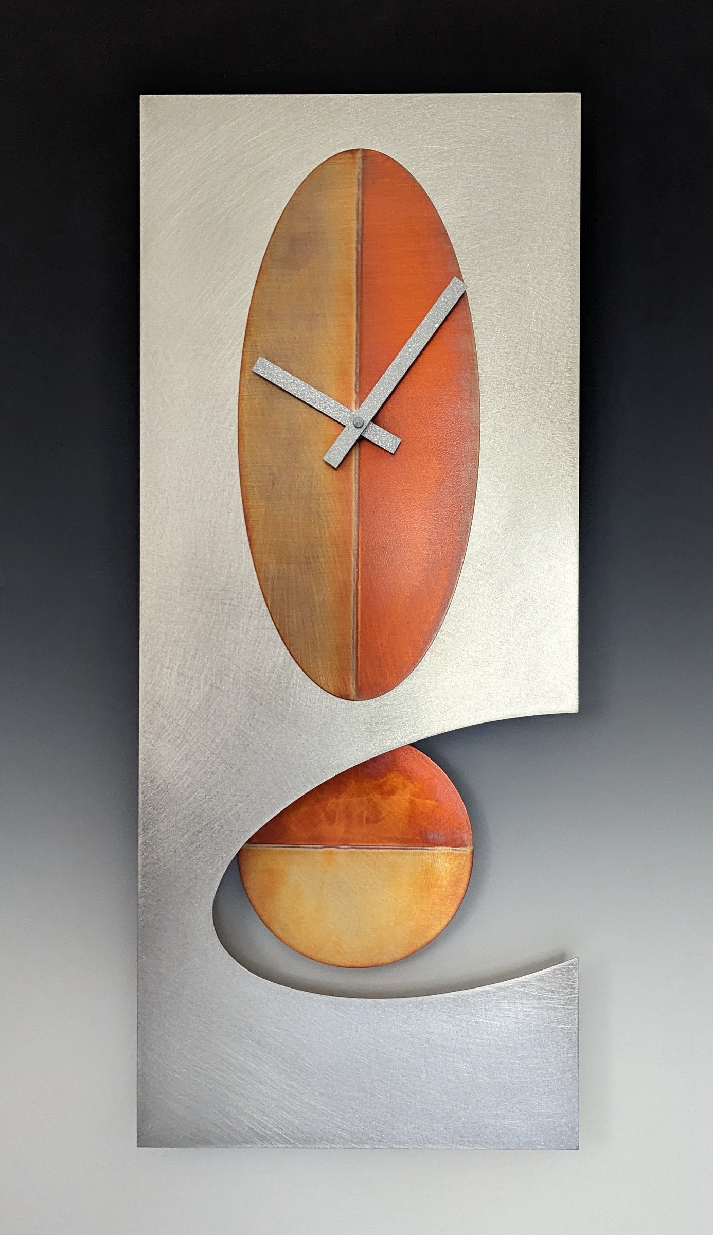 Steel 24 Oval Pendulum Clock
