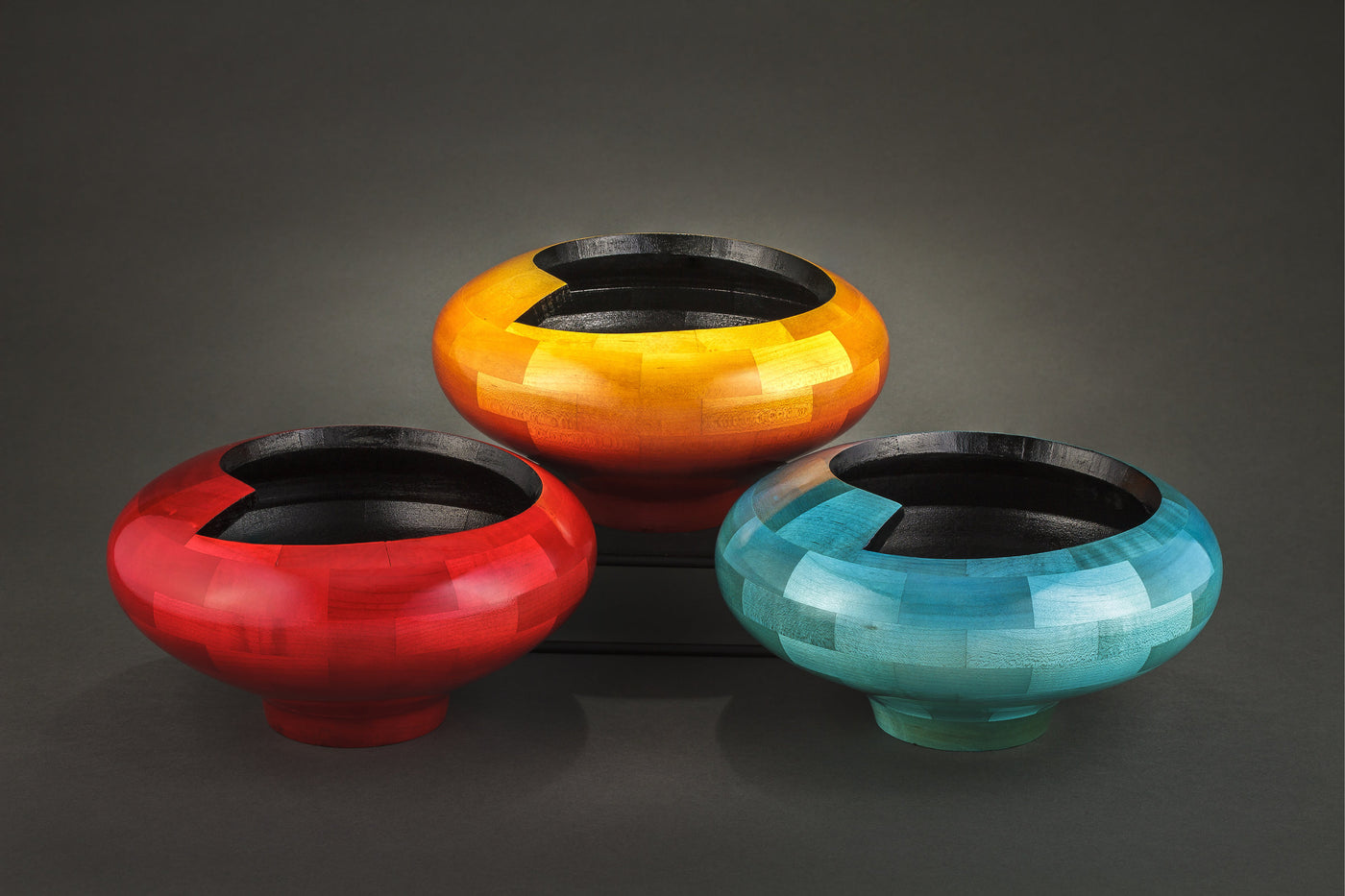 clockwise from top: sunburst, aquamarine, bright red