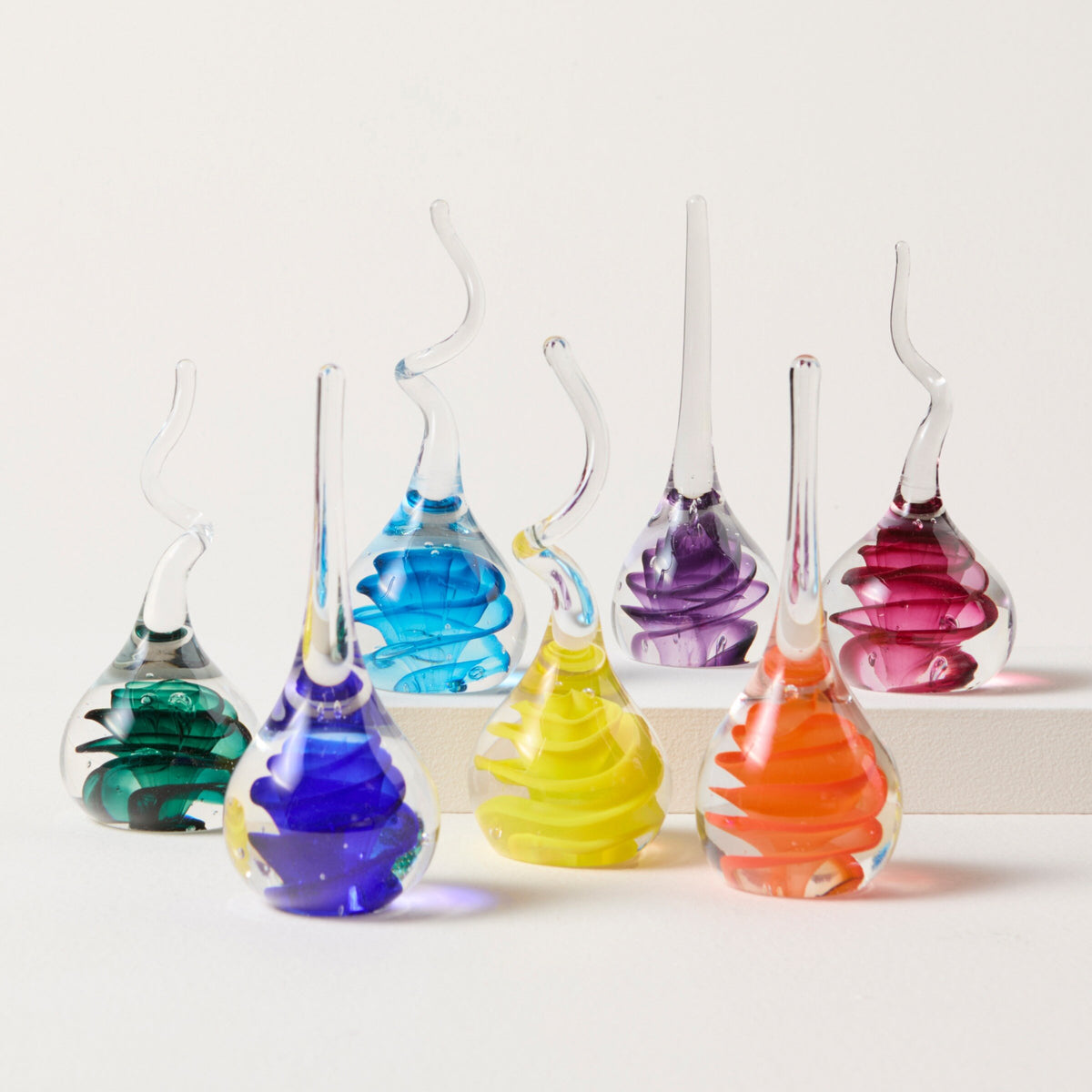 left to right: Ruby, Orange, Yellow, Jade, Aqua, Cobalt, Purple