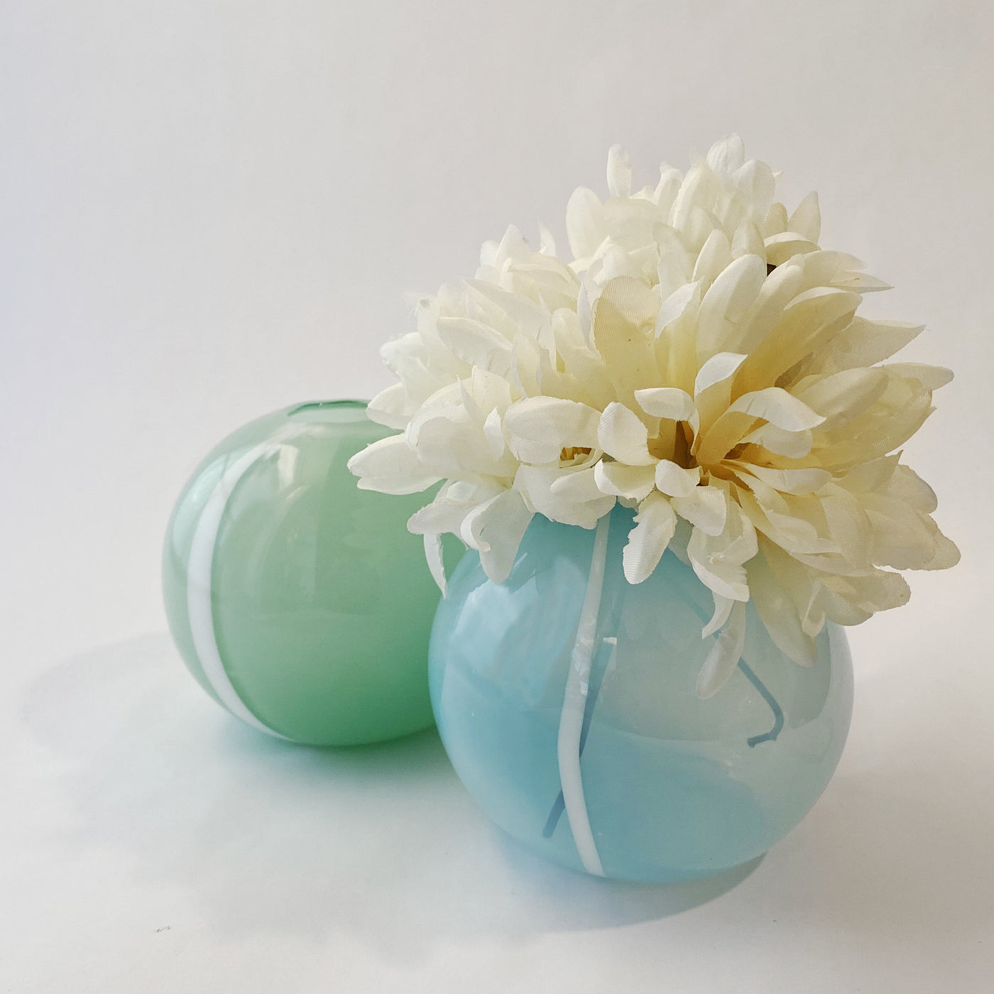 left to right: Mint Green, Opal Blue