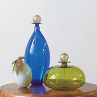 left to right: Cerulean Ellipse, olive squat orb