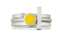 shown stacked with the artist's other rings