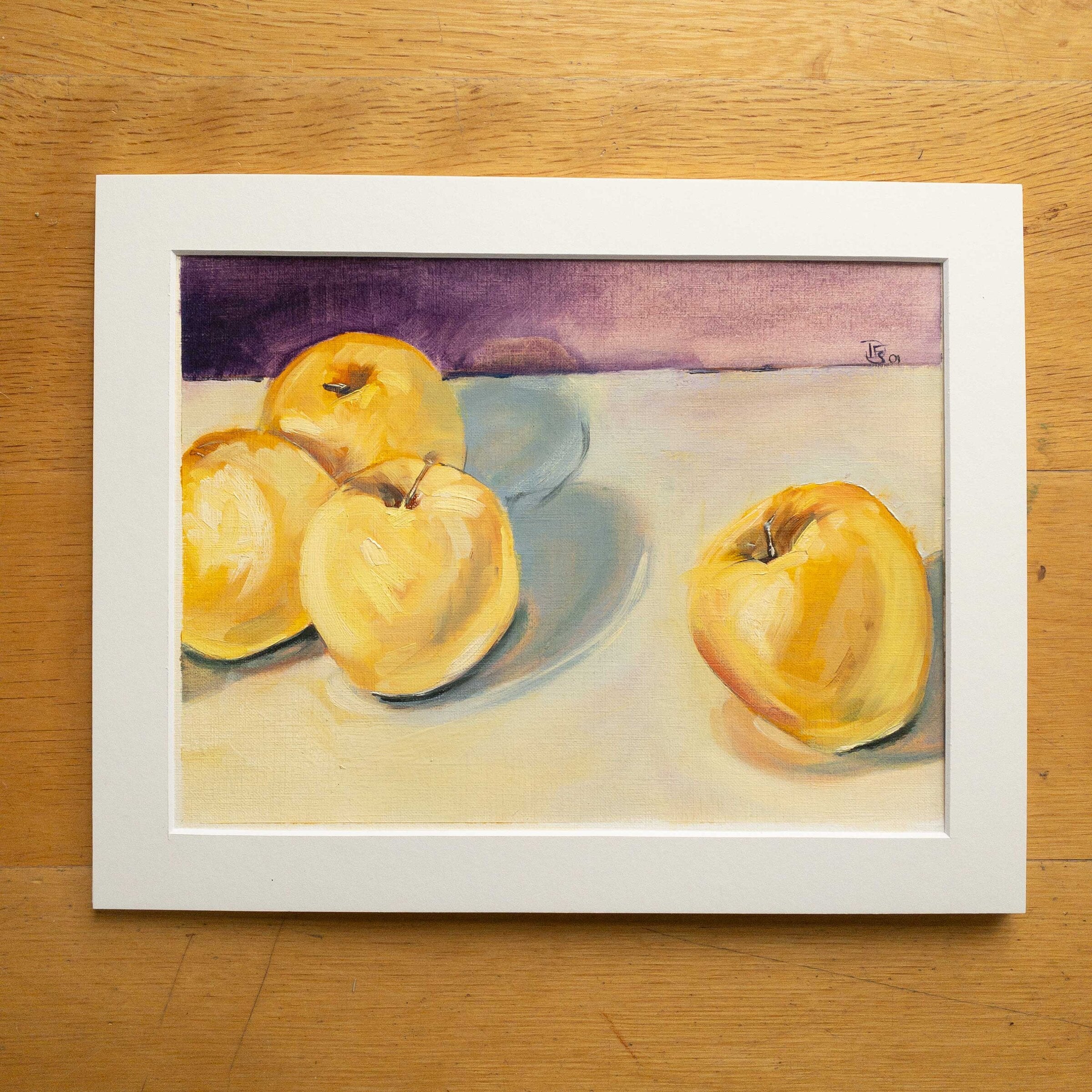 Four Yellow Apples