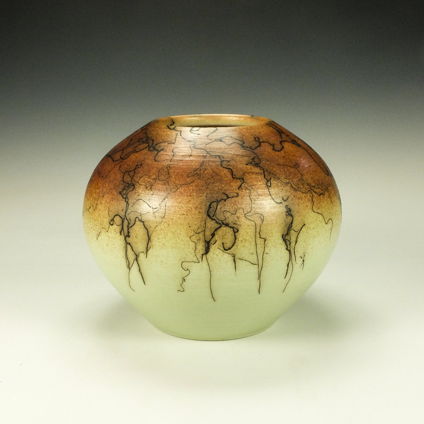 Round Orange and Green Horsehair Raku Vessel