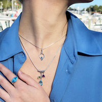 blue topaz with white sapphire accents